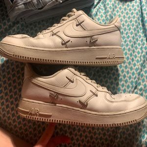 Nike air forces with nike studs on the sides